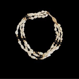 14 karat gold, delicate stone bracelet